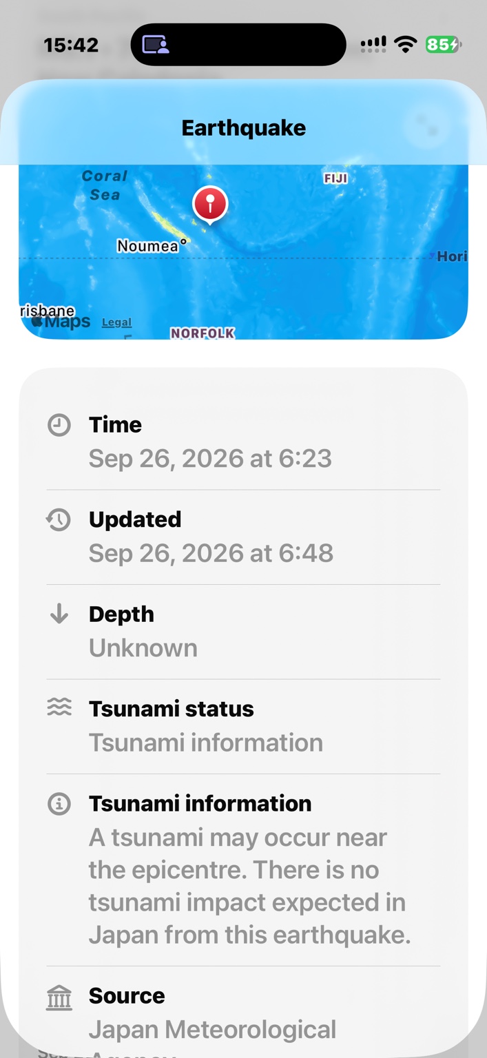 Global Quake+ event details with an English-labelled map near New Caledonia and a source assessment of tsunami impact